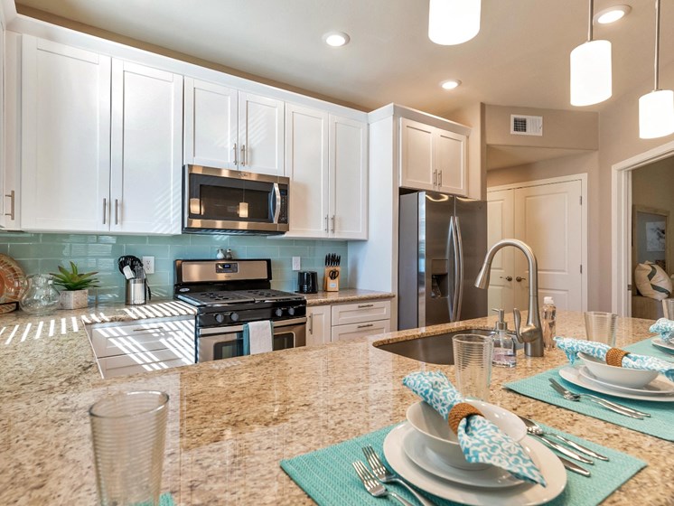 Kitchen (Corporate Apartment) at Bella Victoria Apartments In Mesa, AZ